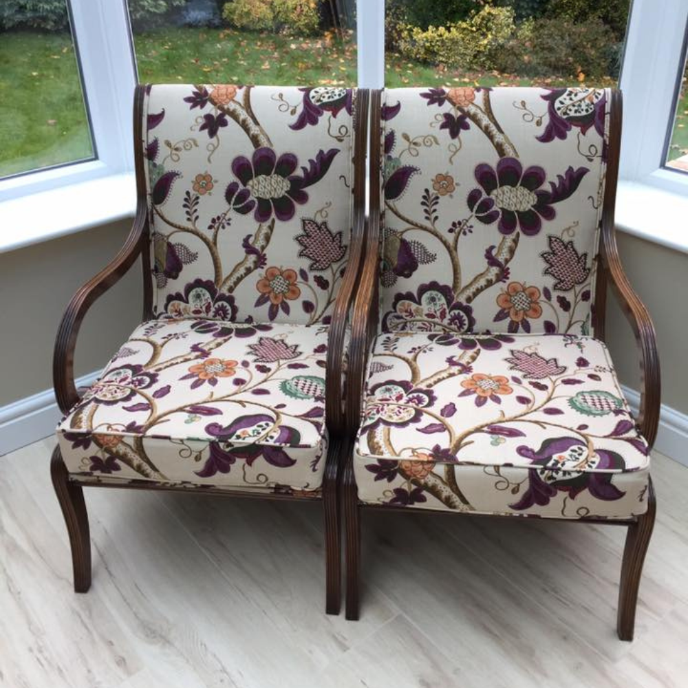 two flower patterned chairs